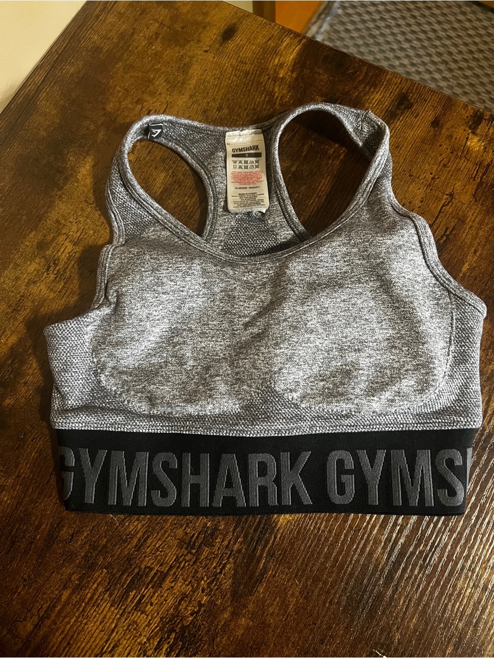 Gymshark Women's Heather Gray Racerback Seamless Sports Bra with Black Logo Band